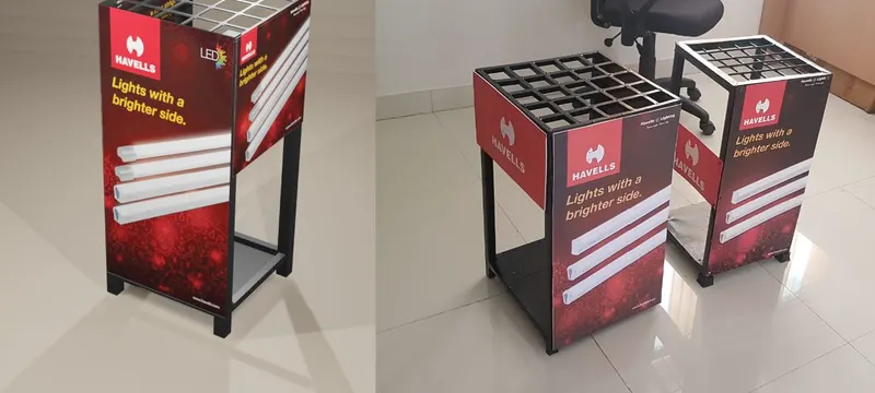 A branded tube light display stand built for retail outlets, shown in 3D design and as produced.